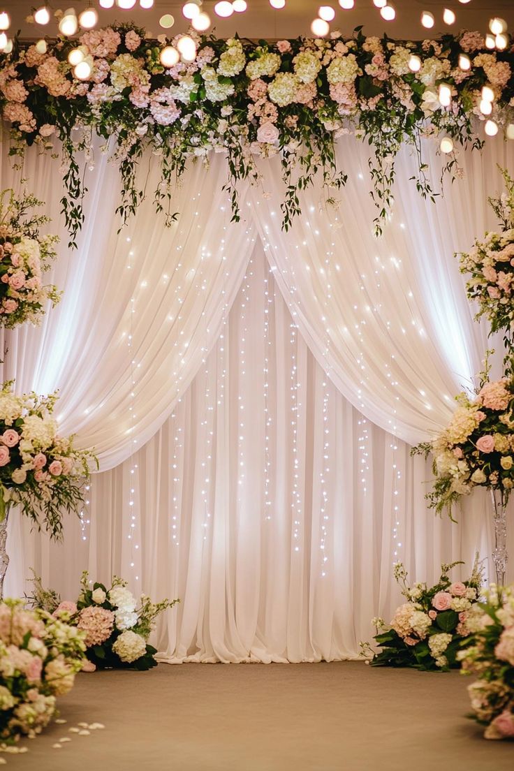 Elegant Indian Wedding Decoration with chandeliers, lush greenery, floral arrangements, and soft lighting creating a luxurious modern ambiance.